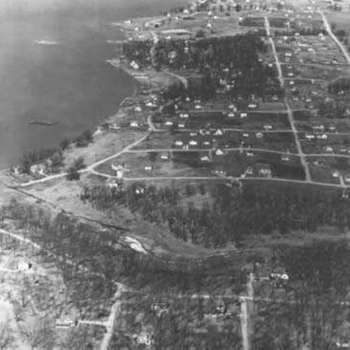 South East Shore of Wonder Lake, 1940. Wooded Shores Subdivision, orginally named Wicklein Bay Farms, is visible in the lower third of the photo, below the creek. Photo by C. Jacobson